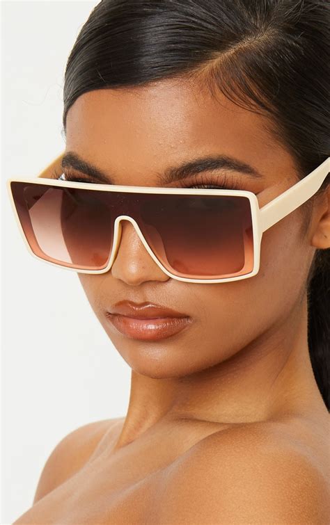 oversized square flat top sunglasses.